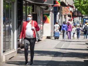 Pregnant woman in mask